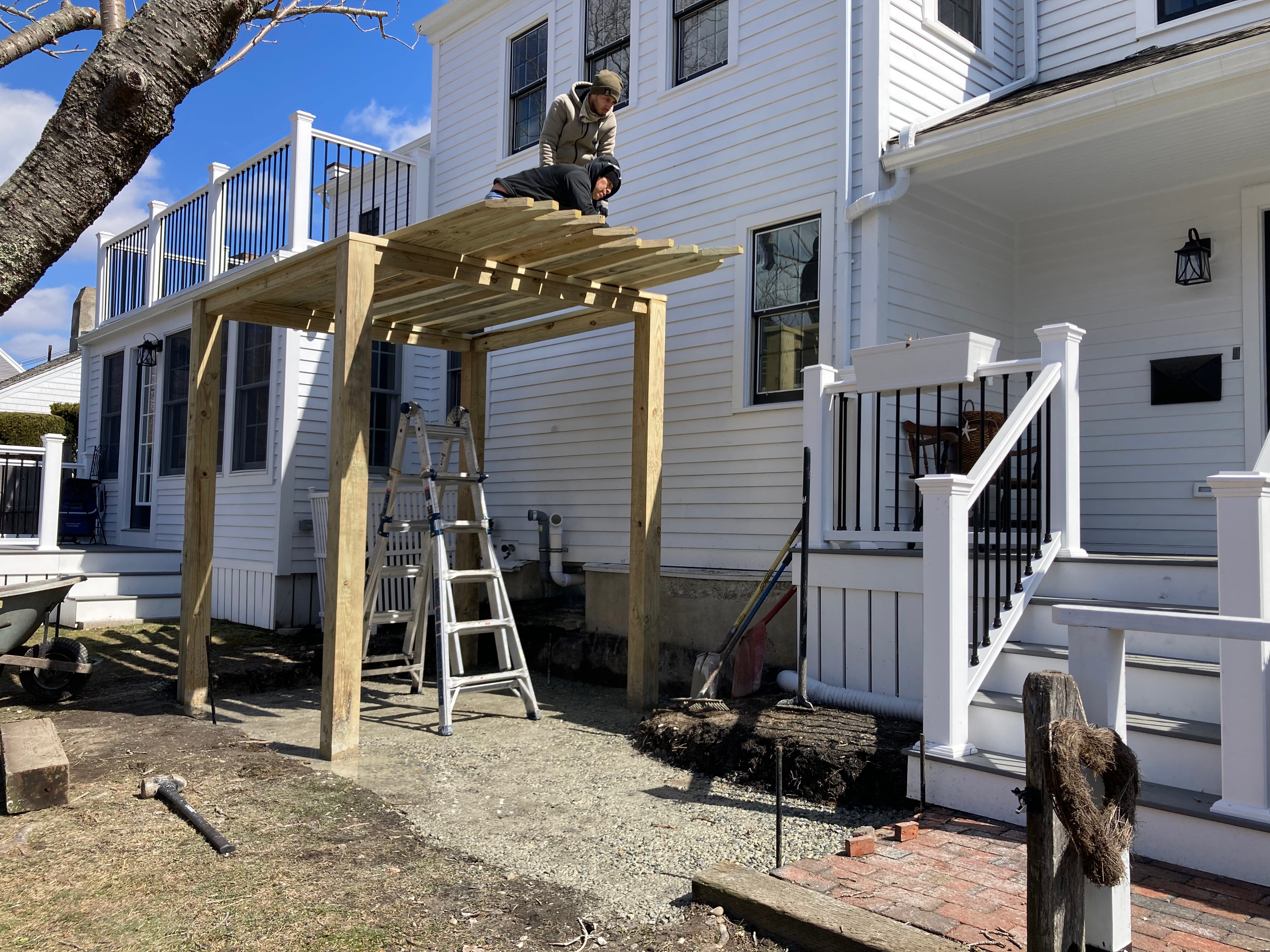 Pergola woodworking custom built small space backyard patio Newbury ma jmj gardens hardscape masonry
