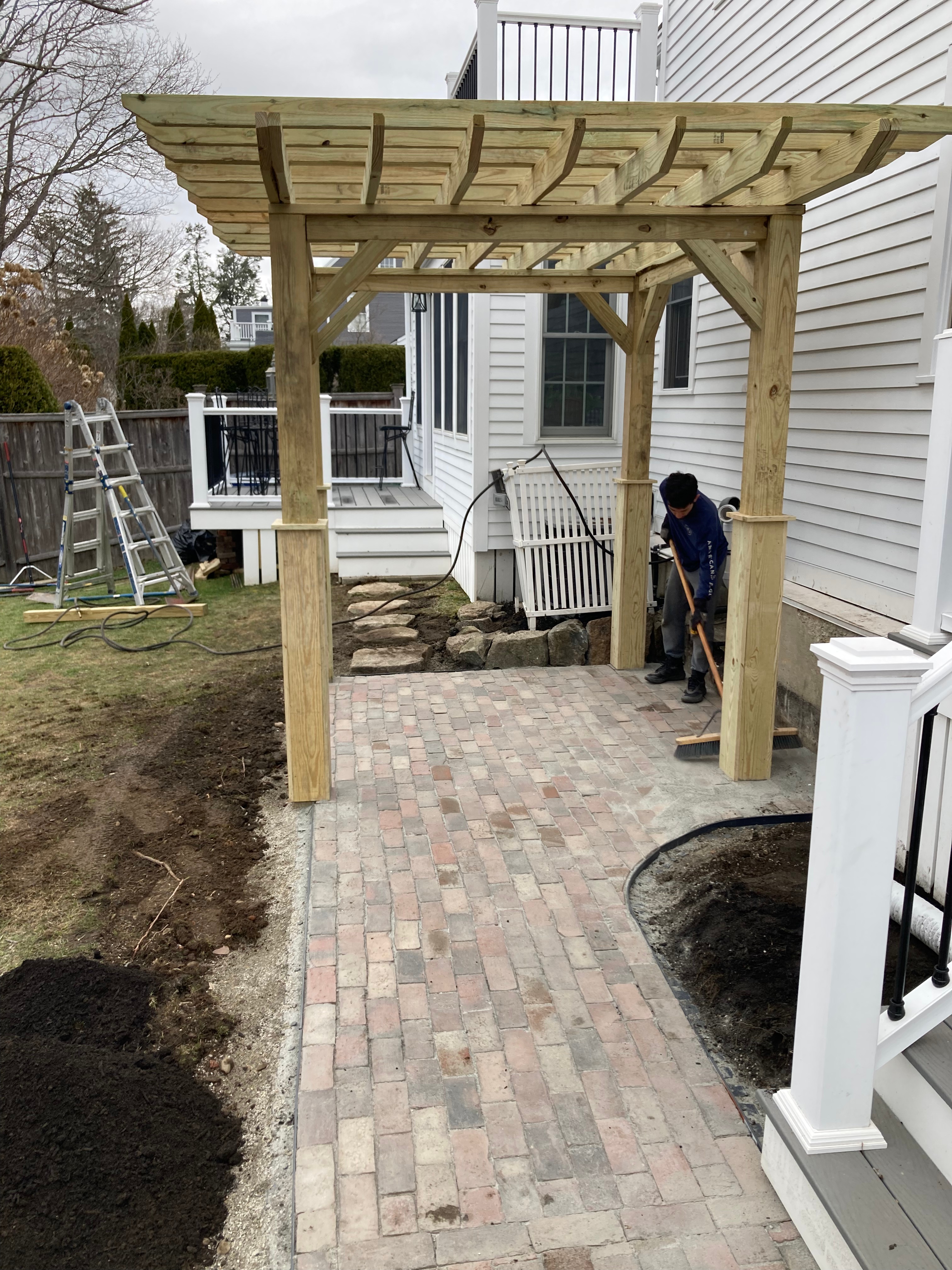 Pergola woodworking custom built small space backyard patio Newbury ma jmj gardens hardscape masonry