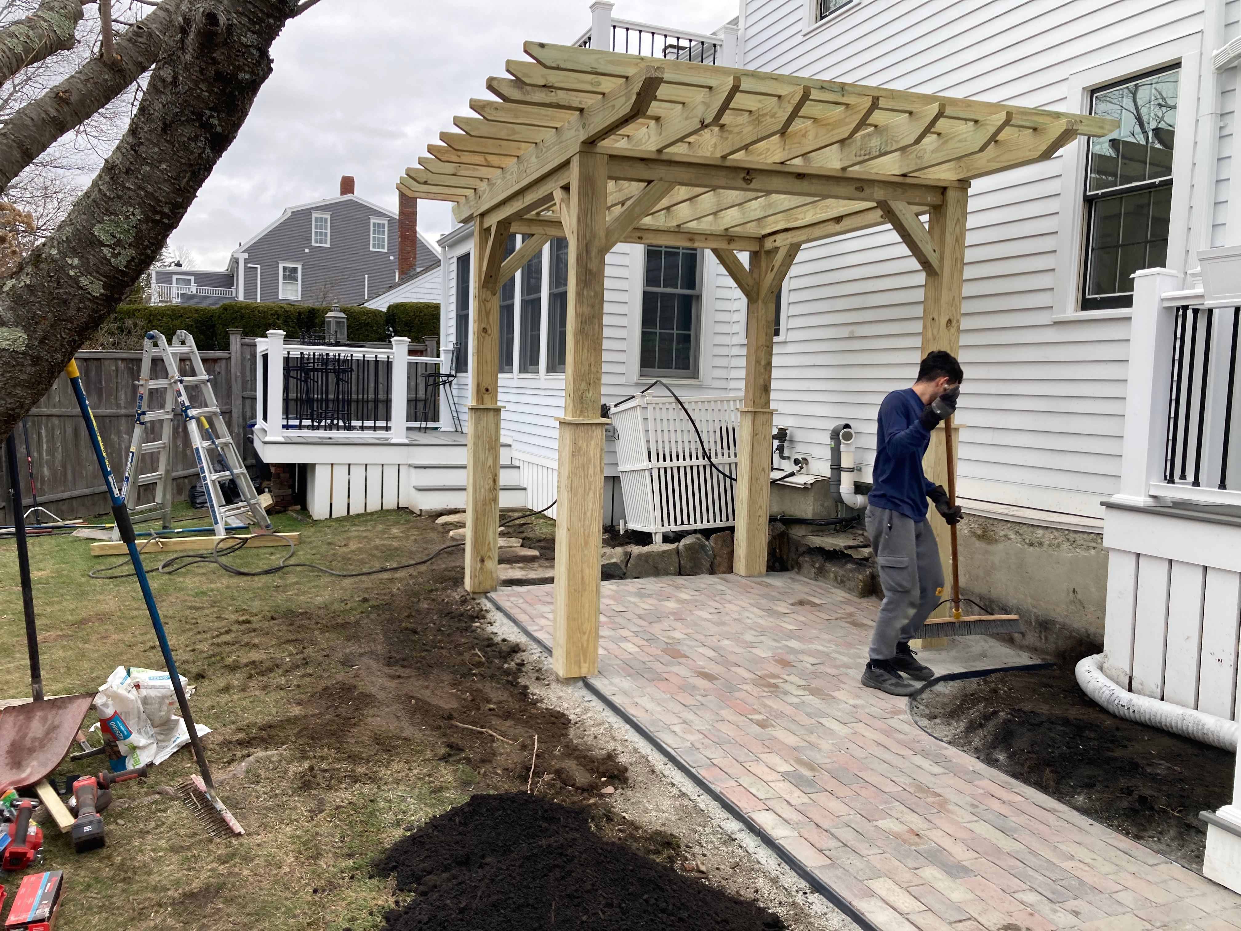 Pergola woodworking custom built small space backyard patio Newbury ma jmj gardens hardscape masonry